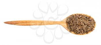 top view of wood spoon with caraway seeds isolated on white background