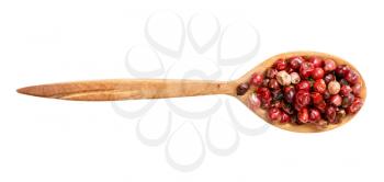 top view of wood spoon with pink peppercorns (Baie rose) isolated on white background