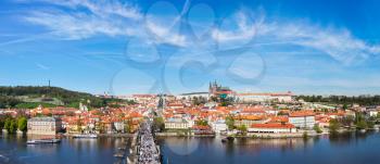 Panorama of Prague: Mala Strana,  Charles bridge and Prague castle from Old Town bridge tower over Vltava river. Prague, Czech Republic