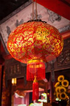 Red traditional Chinese lantern in street