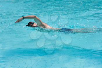Swimming young man (the crawl)