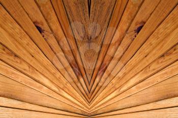 Symmetrical background made from wooden slats.