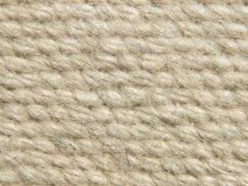 Rough camel wool fabric texture pattern taken closeup as background.
