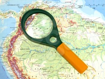 A magnifier on a map from Southern America.