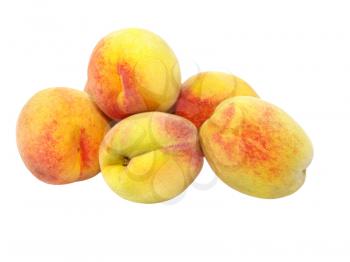 Ripe yellow peaches isolated on white background.