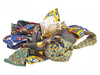 Set of multicolored neckties and fifty dollars bill heaped on a white background. 