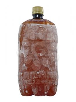 Frozen brown plastic bottle taken closeup isolated on white background.