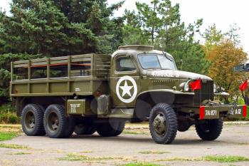 MARIUPOL, UKRAINE-SEPT 9:GMC CCKW 353 Flatbed truck US Army, historical reenactment of WWII, September 9, 2013 in Mariupol,Ukraine