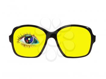 Yellow glasses with color eye inside isolated on white background.