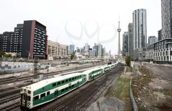 Daytime Photos of Toronto Ontario buildings downtown go train and tracks
