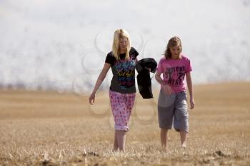 Girls in Field with snowgeese in background