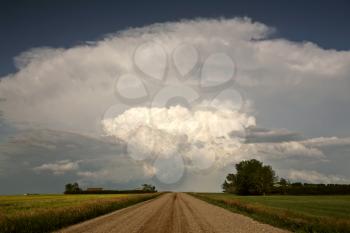 Storm clouds down Saskatchewan country road