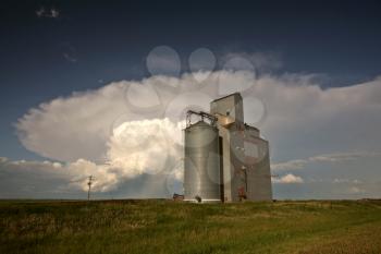 Storm clouds behind Saskatchewan grain terminal