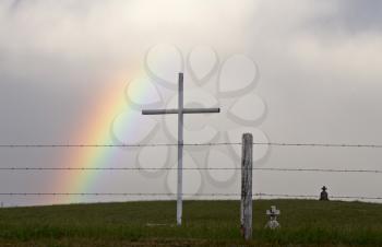 Storm Clouds Saskatchewan cross in country grave yard