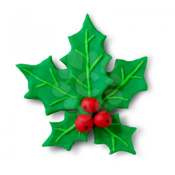 Hand made plasticine figure of Christmas Holly with shadow on white background.