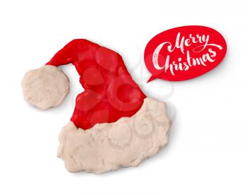 Hand made plasticine figure of Santa hat with shadow and red lettering banner on white background.