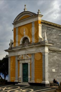 the colored facade  in the old church portofino italy