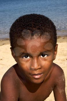 portraif of a little chilld male in the isle of madagascar nosy be 