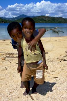 two little boys in a beach in madagascar