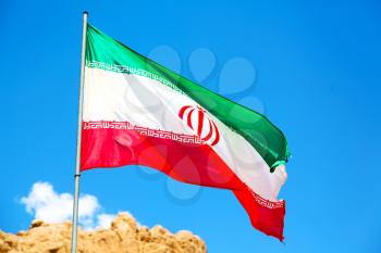 in iran blur  iranian waving flag  the blue sky and wind
