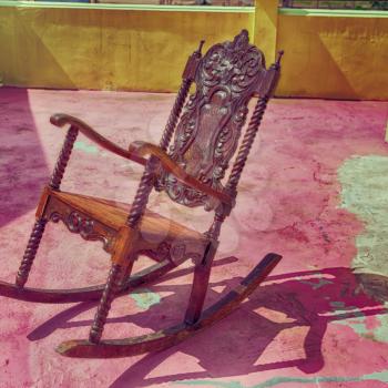 in  philippines old dirty terrace whith rocking chair empty 
