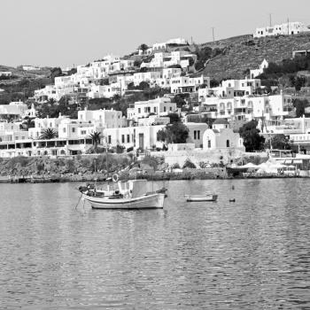  in cyclades island harbor and boat santorini naksos europe house construction old history 