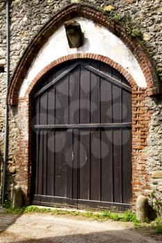 door italy  lombardy     in  the milano old   church   closed brick  pavement