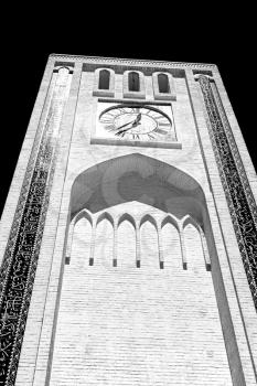 in iran old yazd city and  the antique brick   clock  tower near the sky