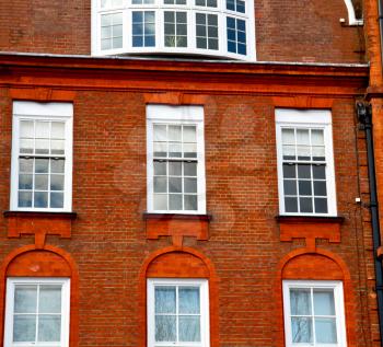 in europe london old red brick wall and          historical window