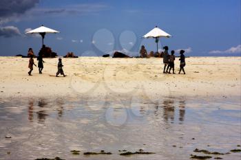 parasol people  hill lagoon and coastline in madagascar nosy be
