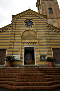 colored facade grey yellow  in the old church divo martino portofino italy