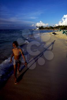 republica dominicana tourist child coastline  peace marble and relax near the caribbean beach 