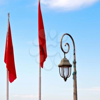 waving flag in the blue sky tunisia  colour and wave    battlements