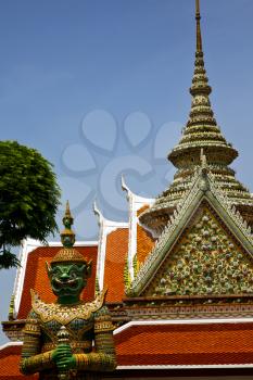  asia  bangkok in   temple  thailand abstract   cross colors roof  wat    sky   and    colors religion mosaic  sunny
