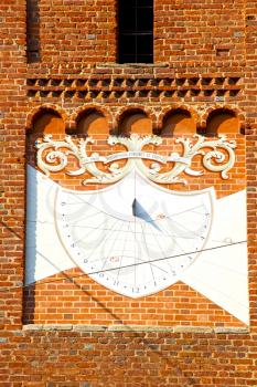 in  the ta old   sunny clock  closed brick tower   italy  lombardy   