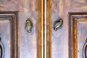  abstract  house door    in italy   lombardy   column  the milano old       closed nail