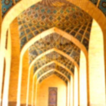 blurred in iran shiraz the corridor passage old mosque and wall arch for islm religion