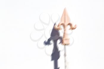 blurred in iran wall and shadow of a metal fence for the home  security like symbol