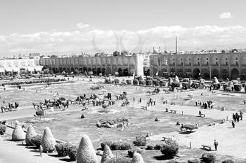 in iran   the old square of isfahan prople garden tree heritage tourism and mosque
