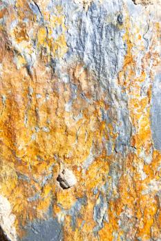 rocks stone and red orange gneiss in the wall of morocco