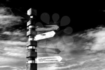 in south africa close up of the blur indication pole of destination  town and  sky