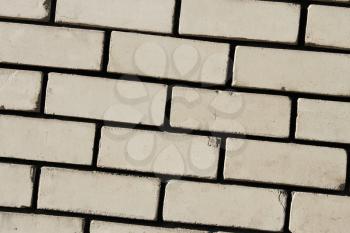 Detail of wall with light bricks. Contrast texture