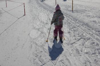 Young girl skiing on a ski track 30330