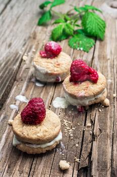 homemade shortbread with custard decorated with raspberries