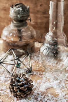 Christmas decoration with an oil lamp in retro style.