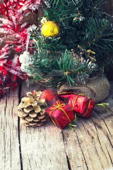 Old fashioned Christmas decoration on wooden background stylish.