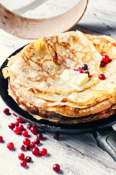Pan cooked tasty pancakes embellished with cranberry