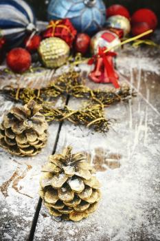Christmas composition with pine cones and ornaments