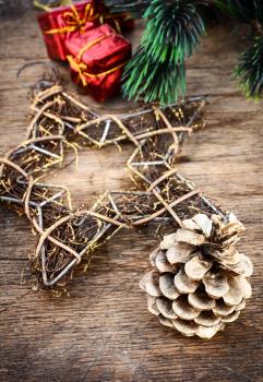 Christmas decorations and gifts on a background of pine branches