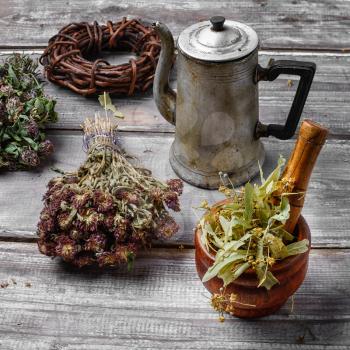Vintage metal teapot with the infusion of medicinal herbs